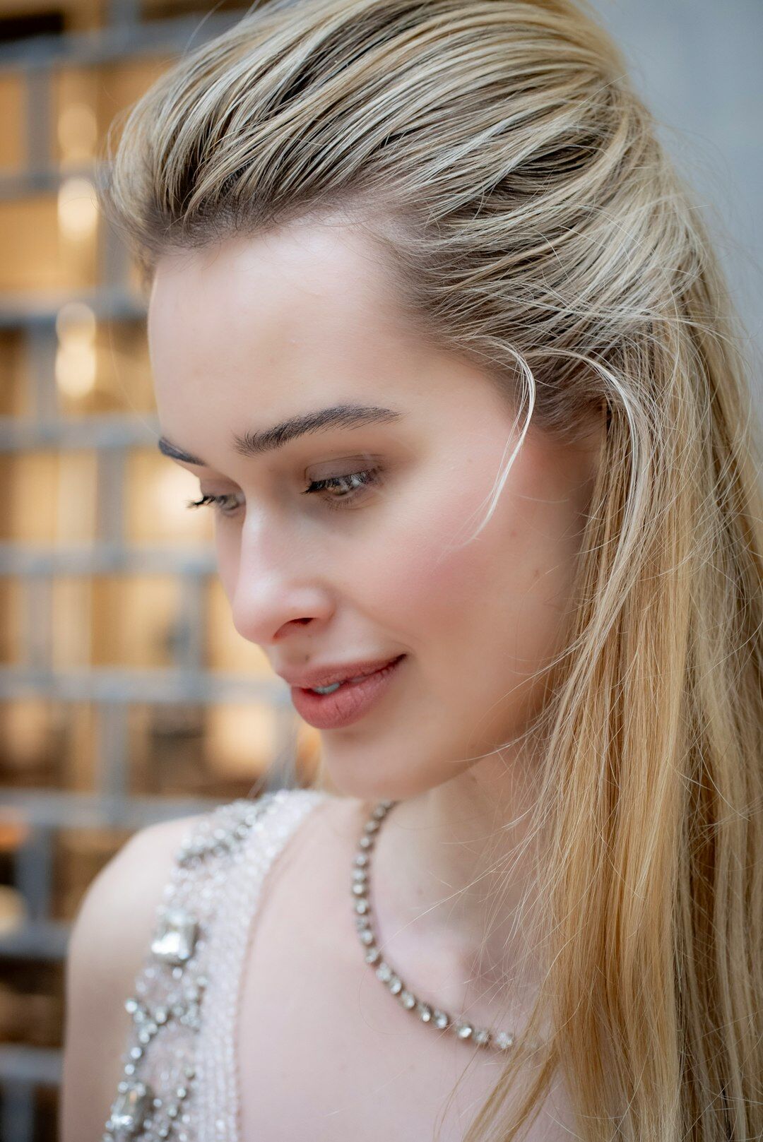 elegant woman wearing diamond necklace
