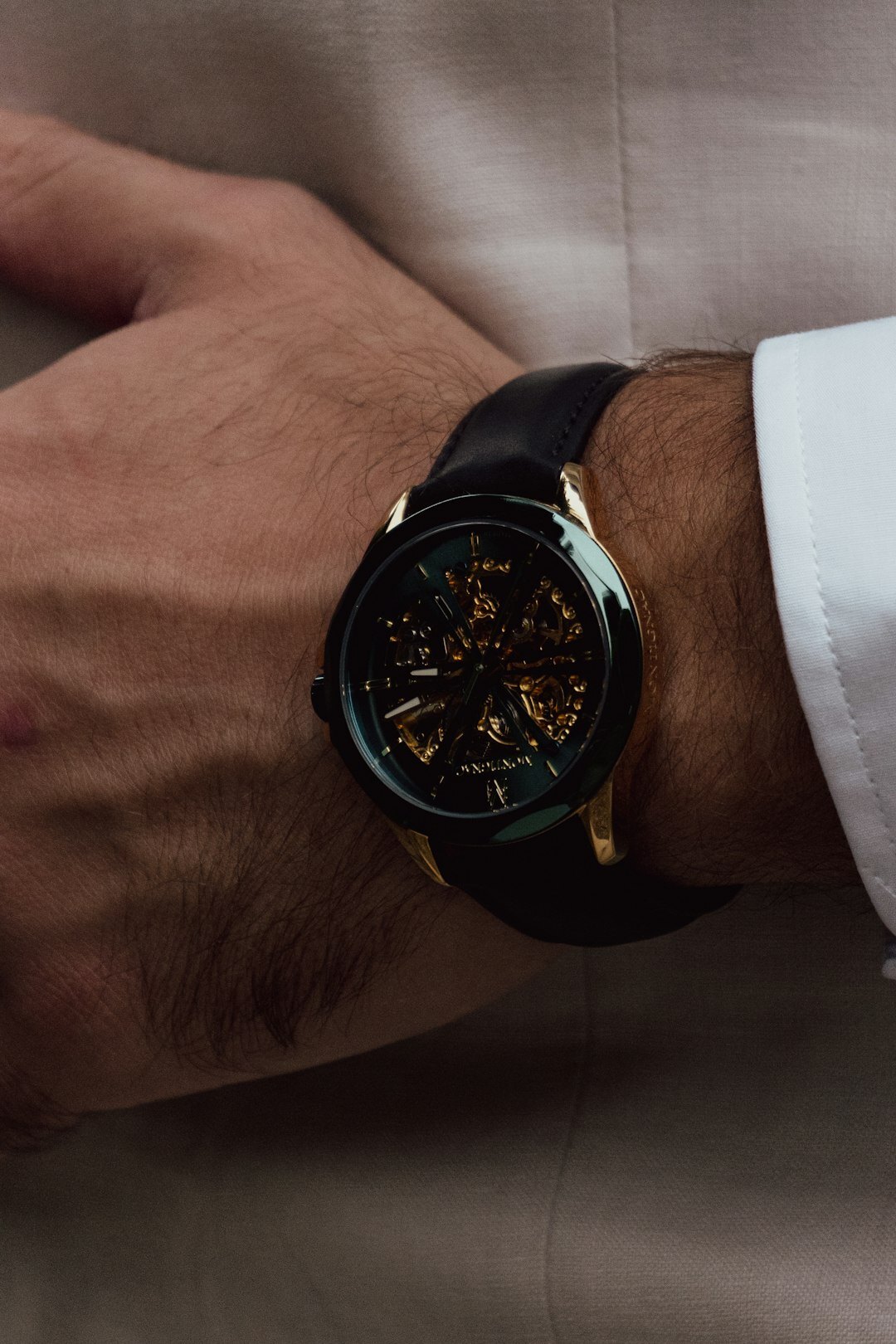 gold bracelet on wrist