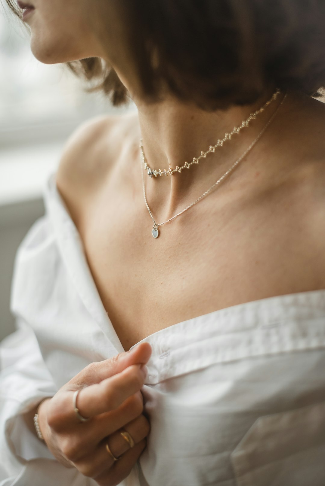 elegant woman wearing diamond necklace