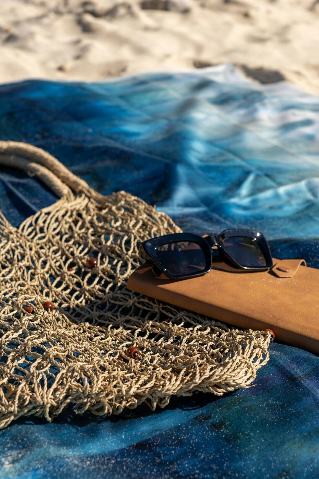 luxury handbag on beach